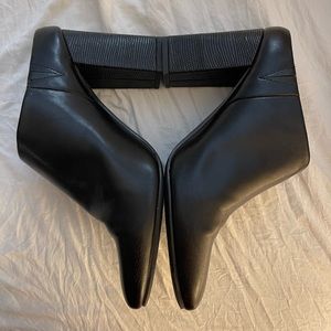 A new day black mules with faux animal skin heels Size 11    worn 1 time